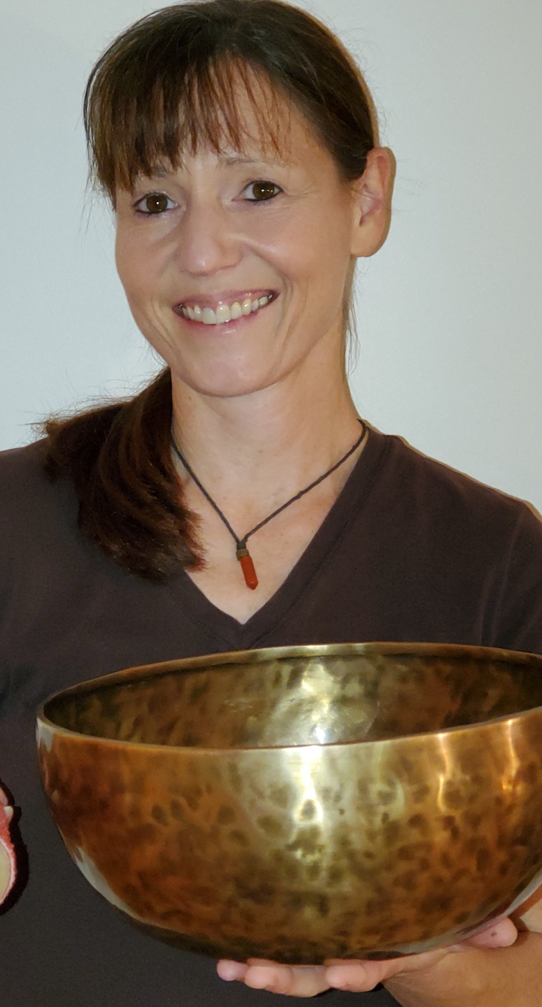 Sound Healing practitioner with Crystal Singing Bowls