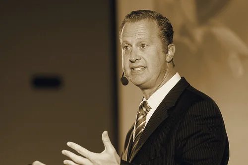 Kurt Mortensen delivering a keynote on stage