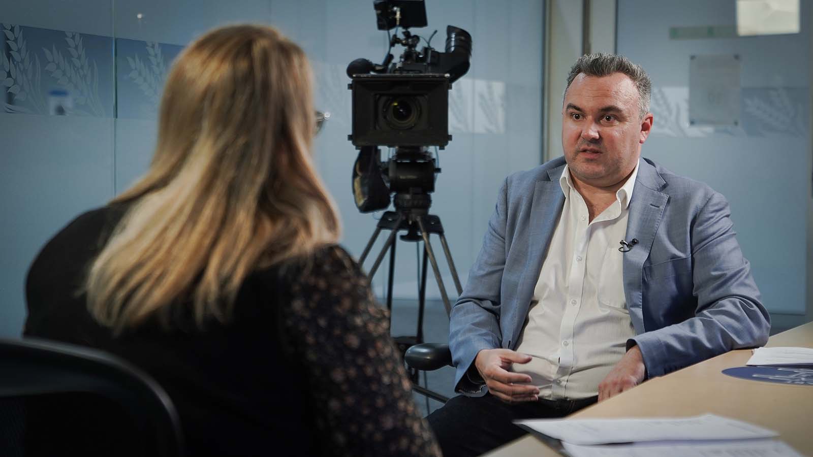 A participant taking part in an on-camera Media Edge interview