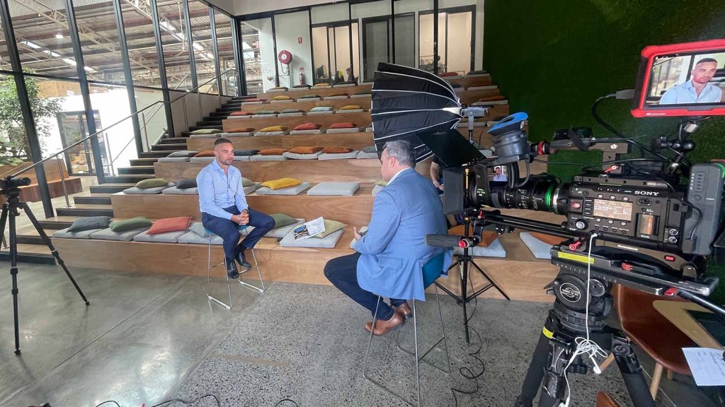 Chris Urquhart conducting television interview practice at URQ HQ