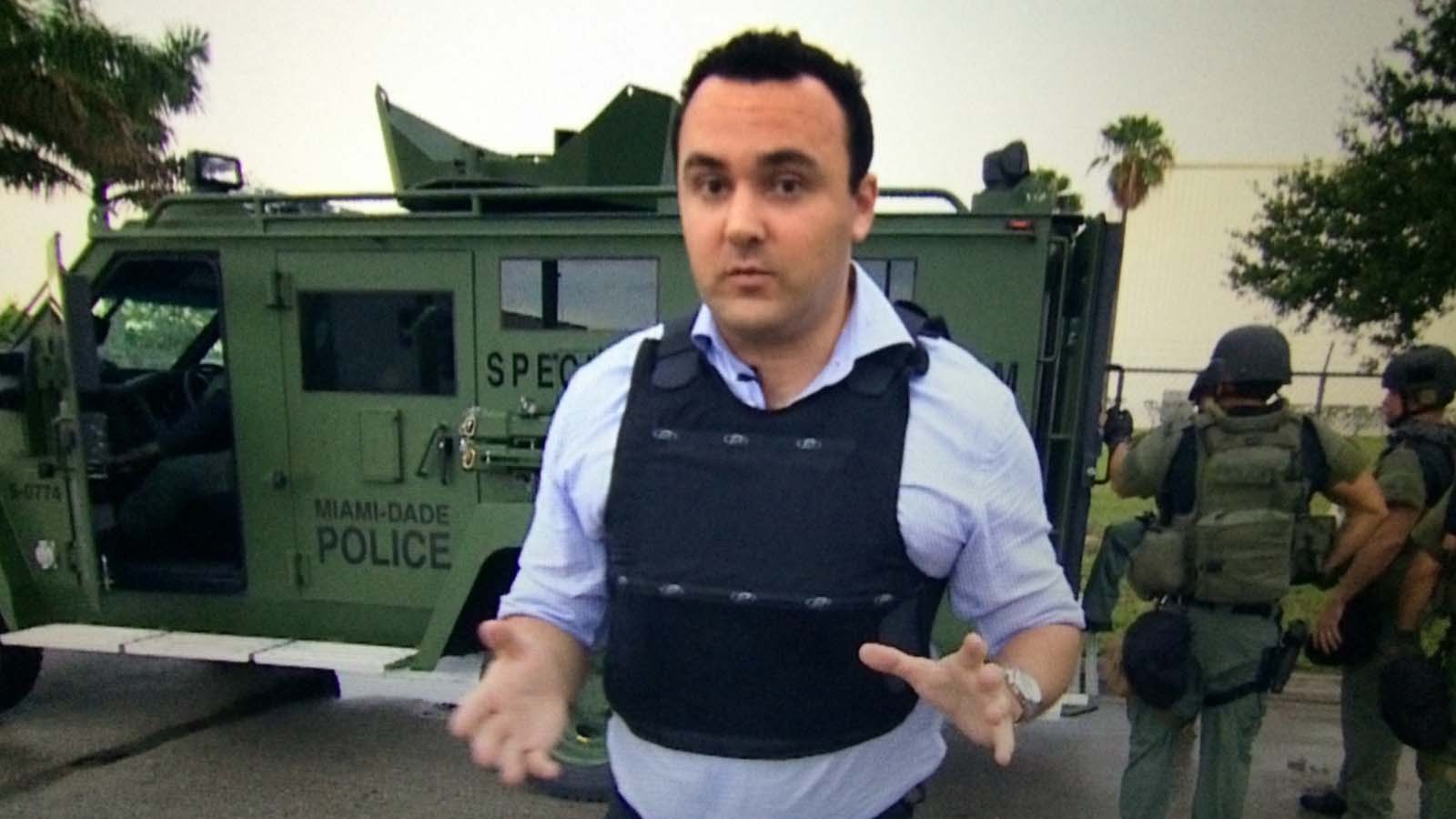 Chris Urquhart reporting on television
