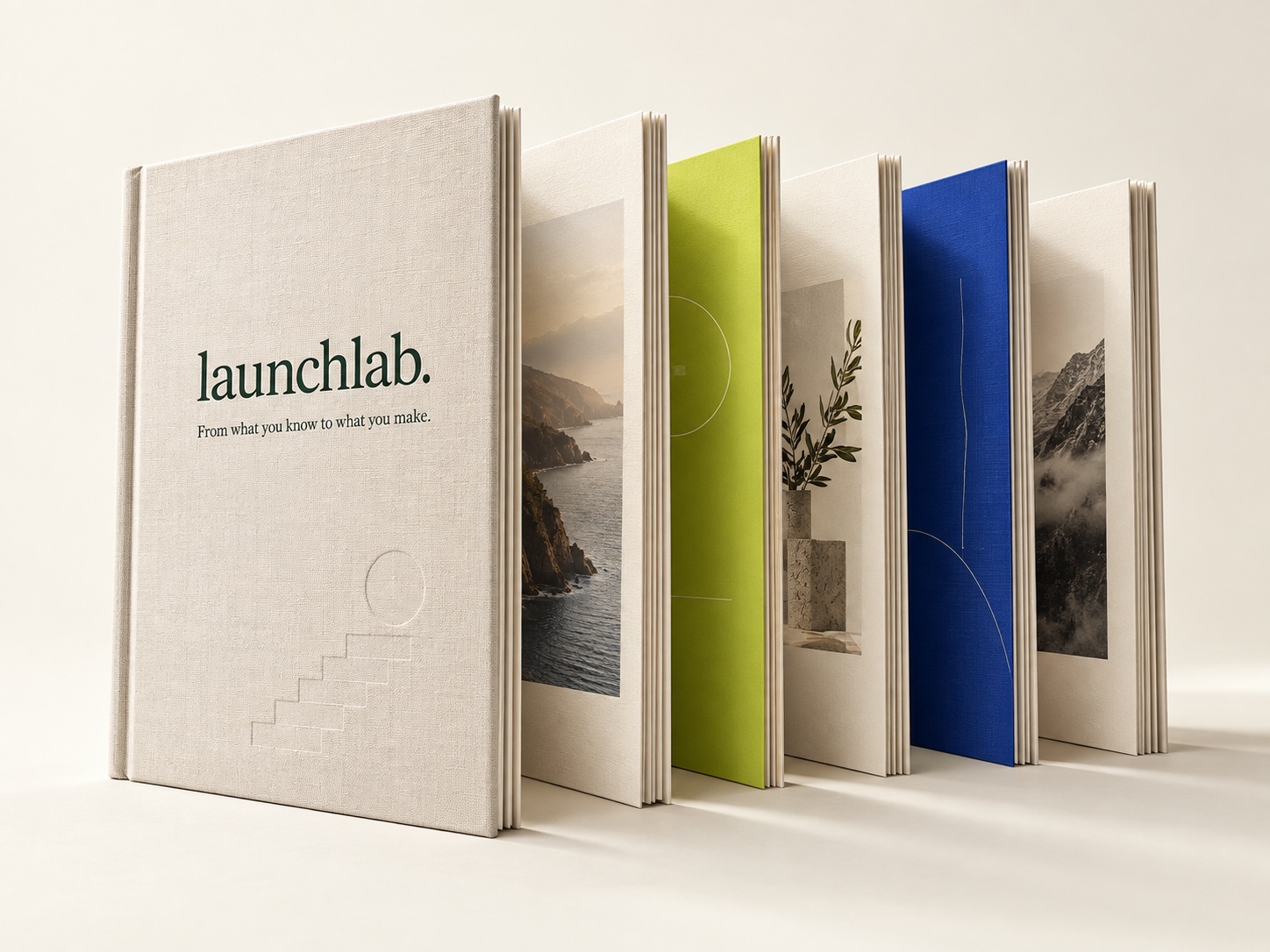 Sculptural LaunchLab linen book with cobalt and lime pages