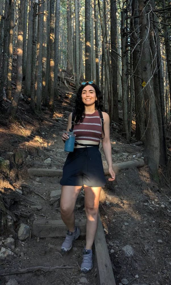 Yasi hiking on a forest trail