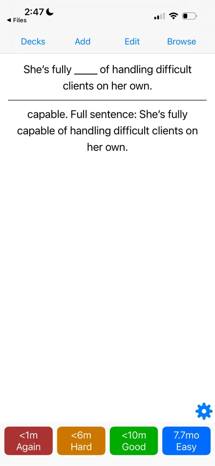 The same card with the answer, capable, and four colored buttons: Again, Hard, Good, Easy