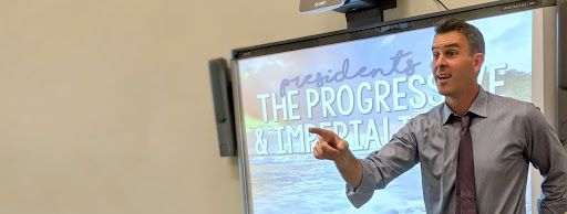 Teacher instructing with interactive digital resources