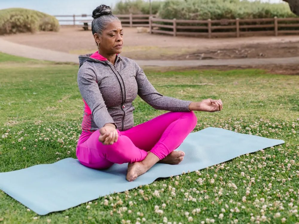 Meditating outdoors in nature