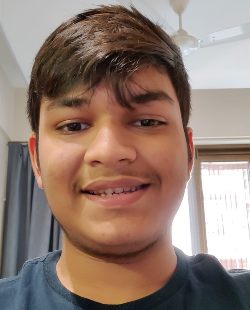 Siddharth, a pleased GradePod student, smiling confidently after sharing his positive experience with the platform, stating how comprehensible and straightforward the IB physics online tutoring is, allowing him to solve problems with ease.