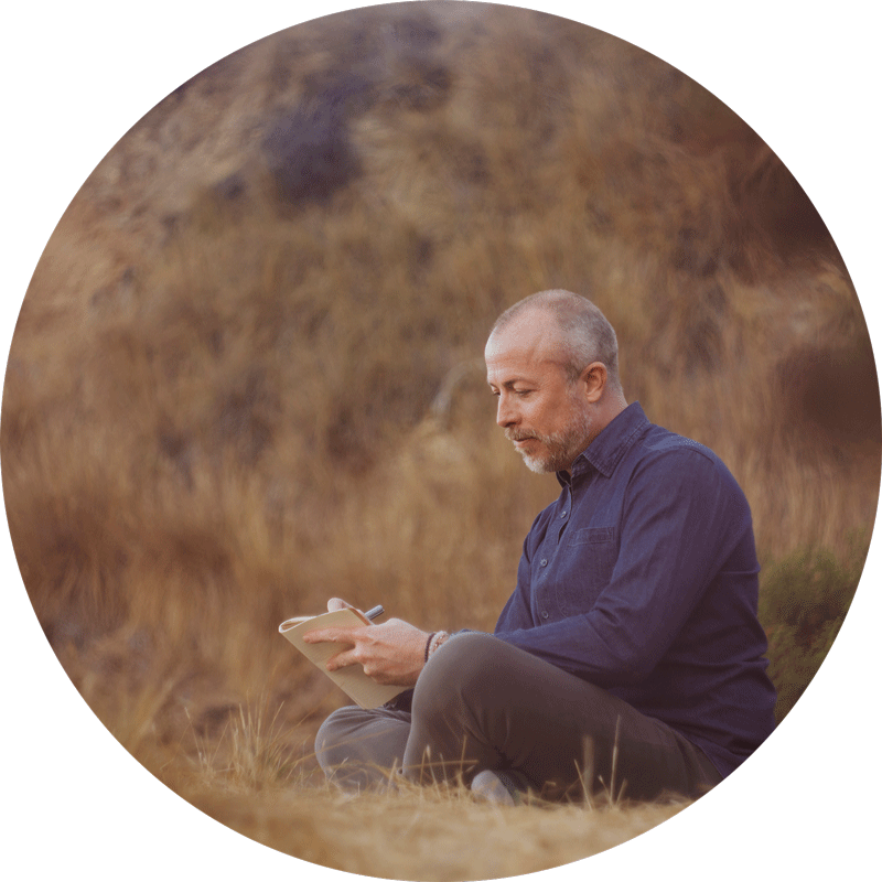 meadow and man journaling