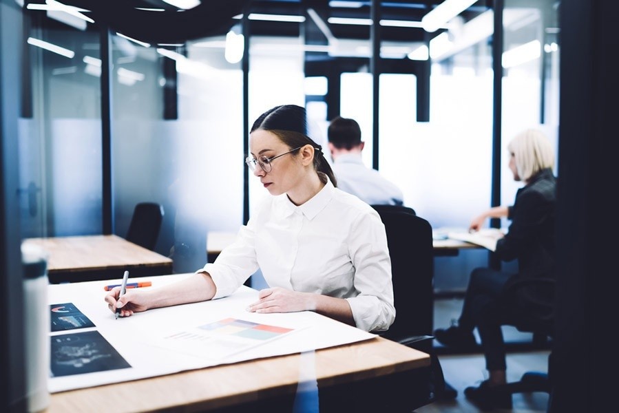 Sitting at a desk in a workplace